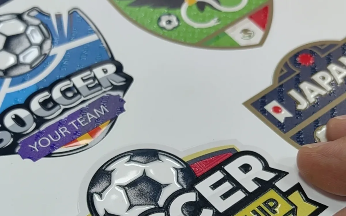 Patch UV DTF bertekstur timbul untuk logo pasukan, SAC Garment Shah Alam